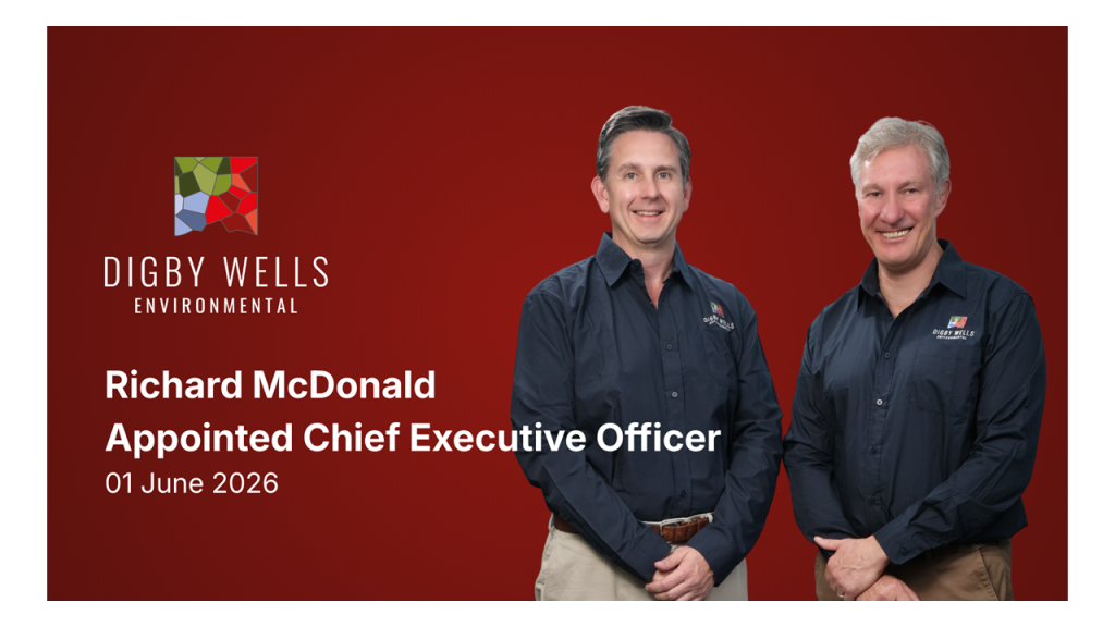Richard McDonald and Graham Trusler standing together against a dark red background, both wearing Digby Wells Environmental branded shirts. Text overlay reads: Richard McDonald Appointed Chief Executive Officer.